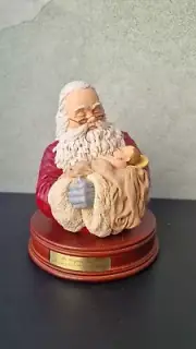 Weeping Santa Holding Baby Jesus exclusively by Roman Inc. 1997