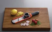 Joseph Joseph Handi-Grate 2-in-1 Mini Grater and Slicer, Orange
