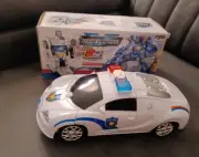Robot Police Car Transformers Toy Lights Sounds Bump and Go Action