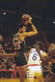 Kareem Abdul-Jabbar Milwaukee Bucks is guarded by Elvin Hayes and - Old Photo
