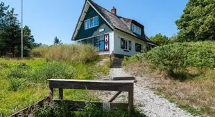 Beautiful dune villa with thatched roof on Ameland 800 meters from the beach