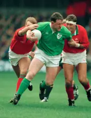 Mike Hall and Emyr Lewis of Wales tackle Michael Galwey of Ire- Old Rugby Photo