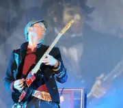 Guitarist Jonny Buckland of Coldplay performs on day three of the - Old Photo