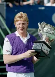 Boris Becker of Germany celebrates with the Norman Brookes Trophy - Old Photo 1