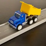 Yellow Dump Truck NEW Road To Gold Driven Battat Pocket Micro Toy Car