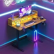Ufurniture Electric Standing Desk with Power Outlets, Adjustable Height Sit Stand up Desk with RGB Light Monitor Shelf, Whole Piece Desktop 120cm Rustic Brown Desktop+Black Frame