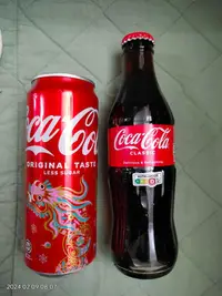 在飛比找Yahoo!奇摩拍賣優惠-新加坡 可口可樂　 玻璃瓶 250ml　　 鋁罐龍年 圖騰 