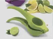 Tupperware Lemon & Lime Squeezer Press Green ergologics citrus press