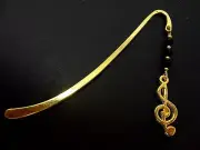 A GOLD COLOUR MUSICAL NOTE TREBLE CLEF CHARM BLACK CRYSTAL BEADS BOOKMARK. NEW.