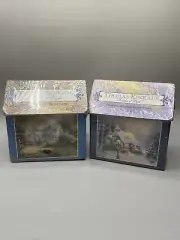 Set of 2 Thomas Kincaid 100 piece miniature jigsaw puzzles