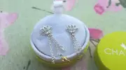 Disney Aladdin Lotus Chain Drop Earrings with gold plated genie lamp design!