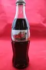 1995 Coca Cola Christmas Bottle Santa in Chair