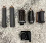 Dyson airwrap attachments only. 6 items. Copper / Nickel. ￼Authentic. Brand New.