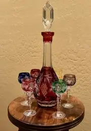 Ajka Marsala Cranberry Color Decanter & 6 Assorted Cordials Glasses 5 1/2” Tall