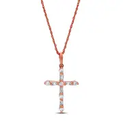 0.2 CT. T.W. Baguette and Round Natural Diamond Cross Pendant in 10K Rose Gold