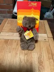 Vintage 9” tall Steiff Bear # 0202/26 he is caramel colored with black eyes 1970