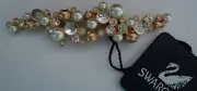 Signed Swan Swarovski Matt Gold Clear Faceted and Fancy Cut Brooch Pin