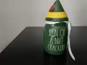 RAE DUNN BUDDY THE ELF, SON OF A NUTCRACKER CANISTER