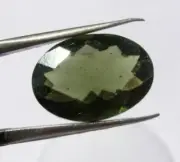 Authentic natural faceted Moldavite 3.02 carats oval shaped about 12x8x6mm
