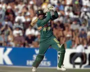 Shaun Pollock batting for South Africa during the Benson and - Old Cricket Photo