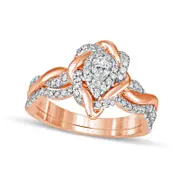 0.63 CT. T.W. Pear-Shaped Natural Diamond Frame Twist Shank Bridal Engagement Ring Set in Solid 10K Rose Gold