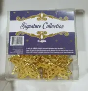 Battery Operated Star Cap LED Light String Gold 8 lights