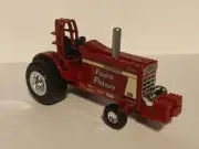 custom 1/64 International "FOOLISH PLEASURE" 1066 IH pulling tractor