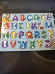 Melissa & Doug Disney Classics Alphabet Wooden Peg Puzzle (26 pcs)