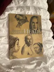 vintage art book titled secrets to drawing heads by Allan Kraay