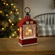 Barn snow globe with horses