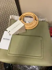Women NWT "Antik Kraft" sage green wicker hand w/shoulder strap and bag inside.