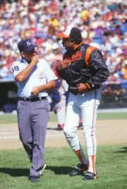 Frank Robinson Baltimore Orioles argues with an umpire in- Baseball 1988 Photo