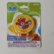 NEW Sesame Street Elmo Pacifier Binky Teether Rattle Clip Holder Yellow