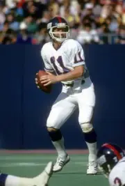Quarterback Phil Simms Of The New York Giants Drops Back Old Football Photo