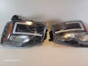 Nissan Headlights EE-DS567 HH3/H11, Both sides with bulbs and electroncis.