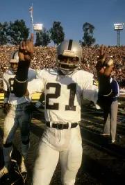 Wide Receiver Cliff Branch Oakland Raiders holds up the number one- Old Photo