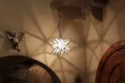 Moravian Star 11.5 inch" clear glass with silver trim with canopy and chain