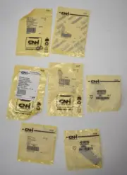 Lot of 7 CNH Industrial New Holland Assorted Parts Clips Washers Nuts Decals