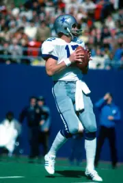 Quarterback Roger Staubach of Dallas Cowboys drops back to pass v- 1976 Photo