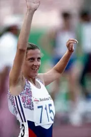 Sally Gunnell of Great Britain acknowledges the crowd after winnin- Old Photo
