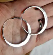 Rustic Brass Oversized Tribal Silver Plated hoops With Hammered Effect .