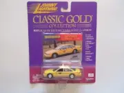 Johnny Lightning Classic Gold 1997 Chevy Caprice Taxi