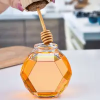 在飛比找樂天市場購物網優惠-蜂蜜瓶廠家竹木蓋500克新款玻璃蜂蜜罐 攪拌棒六棱創意帶蓋蜂