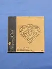 2006 Pampered Chef Cast Iron & Brass Trivet # 2937 ROUND UP FROM THE HEART. New