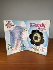 Vintage 1997 Bandai Tamagotchi Angel Pearl Yellow with Gold Wings Brand New