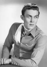 country singer actor Jimmy Dean leaning on elbow while wearing a w- Old Photo