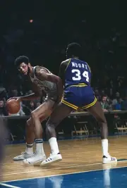 Kareem Abdul Jabbar Milwaukee Bucks dribbles the ball backing in - 1974 Photo