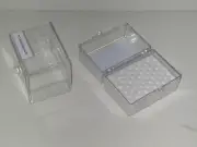 small clear plastic boxes with lids