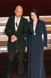 Emmy Awards Howie Mandel and Megan Mullally on stage presenting aw- Old Photo