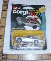 ERTL JAMES BOND 007 ASTON MARTIN SPY CAR NEW ON CARD